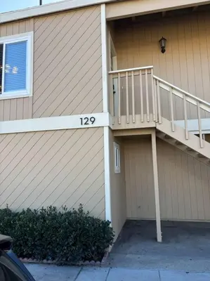 a house with a staircase on the side of it at Newport Beach Rendezvous in Newport Beach