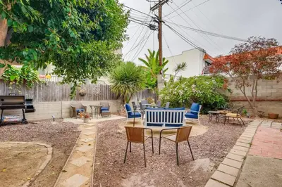 a patio with a table and chairs and a piano at Walk To Beach 2BR Top Location - AA in San Clemente