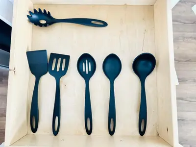 a wooden box with nine forks and spoons at Gillespie Drive 1063 Unit B by sdstay in Spring Valley