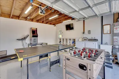 a large room with a ping pong table in it at Double Flamingo HotTub BBQ Game Room Self Check-in in San Diego