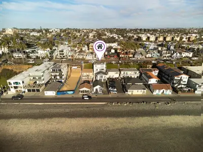 an aerial view of a city with a purple dot at Beachfront Bliss | Shining Sea Condo on The Strand w/ Ocean Views in Oceanside