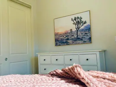 a bedroom with a bed and a painting on the wall at Getaway Retreat Close to Temecula San Diego LA in Murrieta