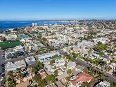 an aerial view of a city with the ocean at Lovely home with backyard oasis & great WiFi - walk to La Jolla Village, dogs OK in San Diego