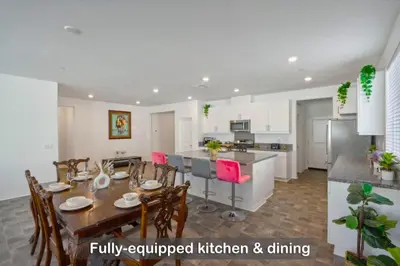a kitchen and dining room with a table and chairs at Entire Private Home with 4 Bedrooms 2 Bathrooms, Mountain Edge, New House, Ranch, Gated Yard, Available Now in Menifee