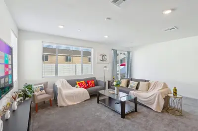 a living room with a couch and chairs and a table at Entire Private Home with 4 Bedrooms 2 Bathrooms, Mountain Edge, New House, Ranch, Gated Yard, Available Now in Menifee