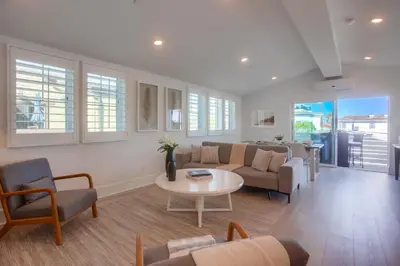 a living room with a couch and a table at Bayside Cove 8 in San Diego