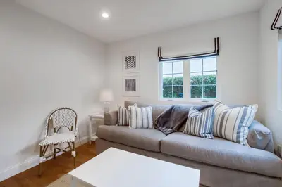 a living room with a couch and a chair at The Shores 7 in San Diego