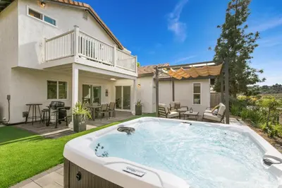 a hot tub in the backyard of a house at Good Vibes Cottage - Carlsbad-Vista-San Diego-Beach-Legoland in Vista