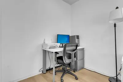 an office with a desk with a computer and a chair at Hilltop Home Hot Tub BBQ Game Room Self Check-In in Poway