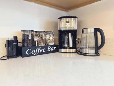 a coffee bar sign on a counter with a coffee appliance at Pet friendly Spacious 3Bed with HUGE Back Yard in San Diego
