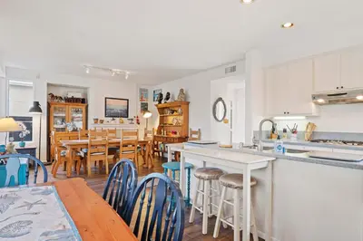 a kitchen and dining room with a table and chairs at Del Mar Deluxe Palace - Majestic - Iconic- Retreat in San Diego
