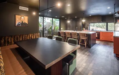 a kitchen with a large wooden table and chairs at Nord Moonlight Beach Luxury Home in Encinitas