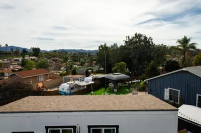 an aerial view of a city with a house at Bird of Paradise Retreat with stunning mountain views in El Cajon