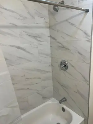 a bathroom with a shower with a white sink at Modern and charming 1 bed first floor apartment in La Mesa