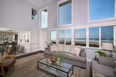 a living room with a couch and a table at Ocean Front Walk in San Diego