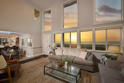 a living room with a couch and a table at Ocean Front Walk in San Diego