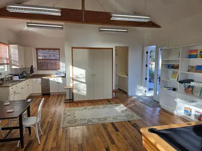 a kitchen with a table and a dining room at Relaxing Countryside Resort Guest House in Poway