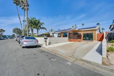 a car parked in front of a house at House Kitsune - Steps to Beach in Oceanside