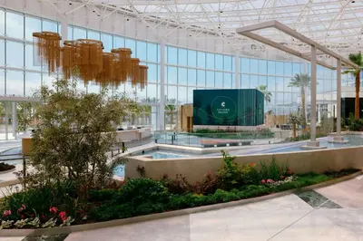 a large glass building with a large screen in it at Gaylord Pacific Resort & Convention Center in Chula Vista