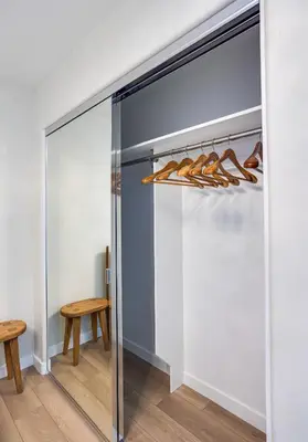 a walk in closet with a sliding glass door at Newly Remodeled Home in Escondido
