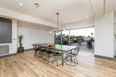 a dining room with a table and chairs at Artistic FastWiFi Parking Pets in San Diego