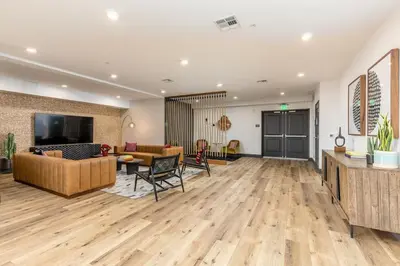 a living room with a couch and a table at Artistic FastWiFi Parking Pets in San Diego