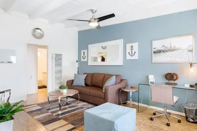 a living room with a couch and a table at Seaside King 1bd Haven, Pets, Fast Wi-Fi Parking in San Clemente