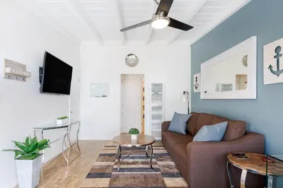 a living room with a couch and a table at Seaside King 1bd Haven, Pets, Fast Wi-Fi Parking in San Clemente