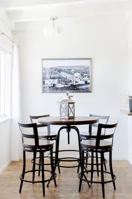 a dining room with a table and four chairs at Seaside King 1bd Haven, Pets, Fast Wi-Fi Parking in San Clemente