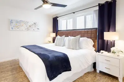 a bedroom with a large bed and a window at Seaside King 1bd Haven, Pets, Fast Wi-Fi Parking in San Clemente