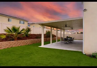 a patio with a table and chairs in a house at 6 BR Pool & Games Retreat - Summer Near Wineries in Winchester
