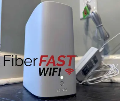 a feather fast wifi router sitting on a table at Entire Private Home with 3 Bedrooms, Gated Yard, Parking, King Bed, Available Now in Spring Valley