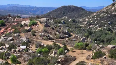 an aerial view of a mountain with rocks and trees at Cozy Dome Hideaway with Sweeping Sunrise View in Fallbrook
