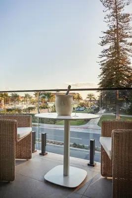a table with a bowl on it in front of a window at The Bower Coronado in San Diego