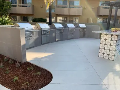 a patio with a row of washers and dryers at Winners Circle Resort in Solana Beach