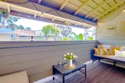a screened in porch with a bench and a window at Entire Private Home with 3 Bedrooms 2 Bathrooms, Family Home Free Pool, Tub and Parking, Available Now in Chula Vista