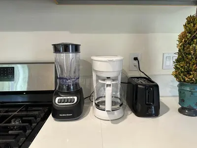 a blender and a toaster sitting on a kitchen counter at Entire Private Home with 3 Bedrooms 2 Bathrooms, Family Home Free Pool, Tub and Parking, Available Now in Chula Vista