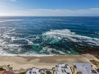 an aerial view of the beach and ocean at Draper Bungalow By CoastVH - Charming 1940 in San Diego