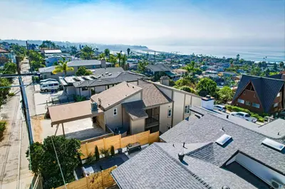an aerial view of roofs of houses at Cardiff View in Cardiff-by-the-Sea