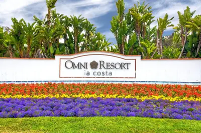 a sign at the entrance to the om resort a costas at La Costa Condo Pool BBQ Gated Parking in Carlsbad