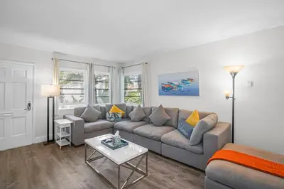 a living room with a couch and a table at 500 ft to Ocean Relaxing stay Parking WiFi 834 in San Diego