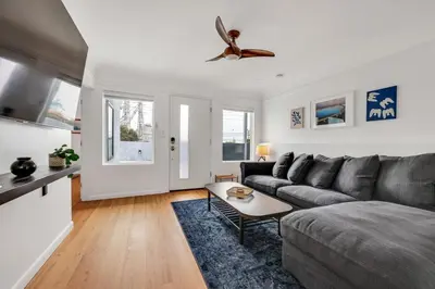 a living room with a couch and a table at Harborside Suite 12 with Hot Tub and King Beds in San Diego