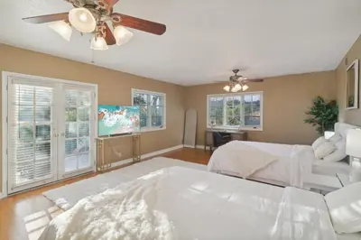 a bedroom with a bed and a ceiling fan at Entire Private Home with 5 Bedrooms 4 Bathrooms, 3-Acres Estate, 3000 sqft, near Winery in Fallbrook, Available Now in Fallbrook