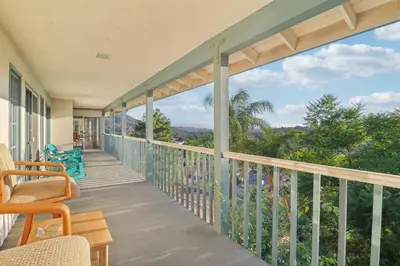 a balcony with a view of the mountains at Entire Private Home with 5 Bedrooms 4 Bathrooms, 3-Acres Estate, 3000 sqft, near Winery in Fallbrook, Available Now in Fallbrook