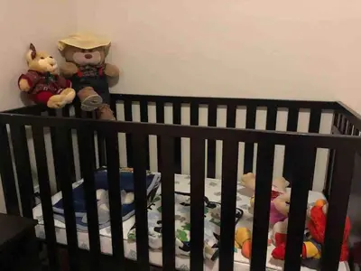 a crib with stuffed animals sitting on it at Entire Private Home with 5 Bedrooms 4 Bathrooms, 3-Acres Estate, 3000 sqft, near Winery in Fallbrook, Available Now in Fallbrook