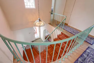an overhead view of a staircase in a house at Casa Rosa in San Diego