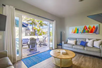 a living room with a couch and a table at Coastal Haven in San Diego