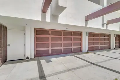 two sets of garage doors on a building at Ocean Park 08 in San Diego