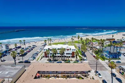 an aerial view of a beach with palm trees and the ocean at Ocean Park 03 in San Diego