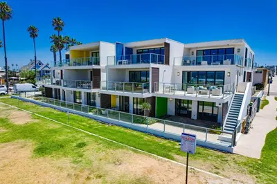 a large white building with a lawn in front of it at Ocean Park 05 in San Diego